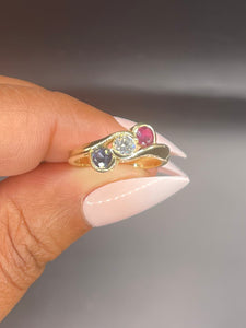 Ruby, sapphire and diamond ring